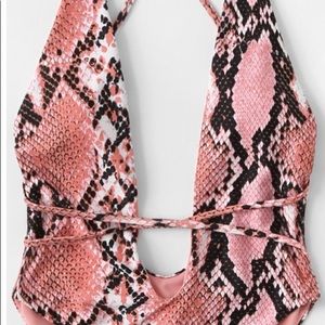 Deep plunge cut bathing suit in lizard pink print